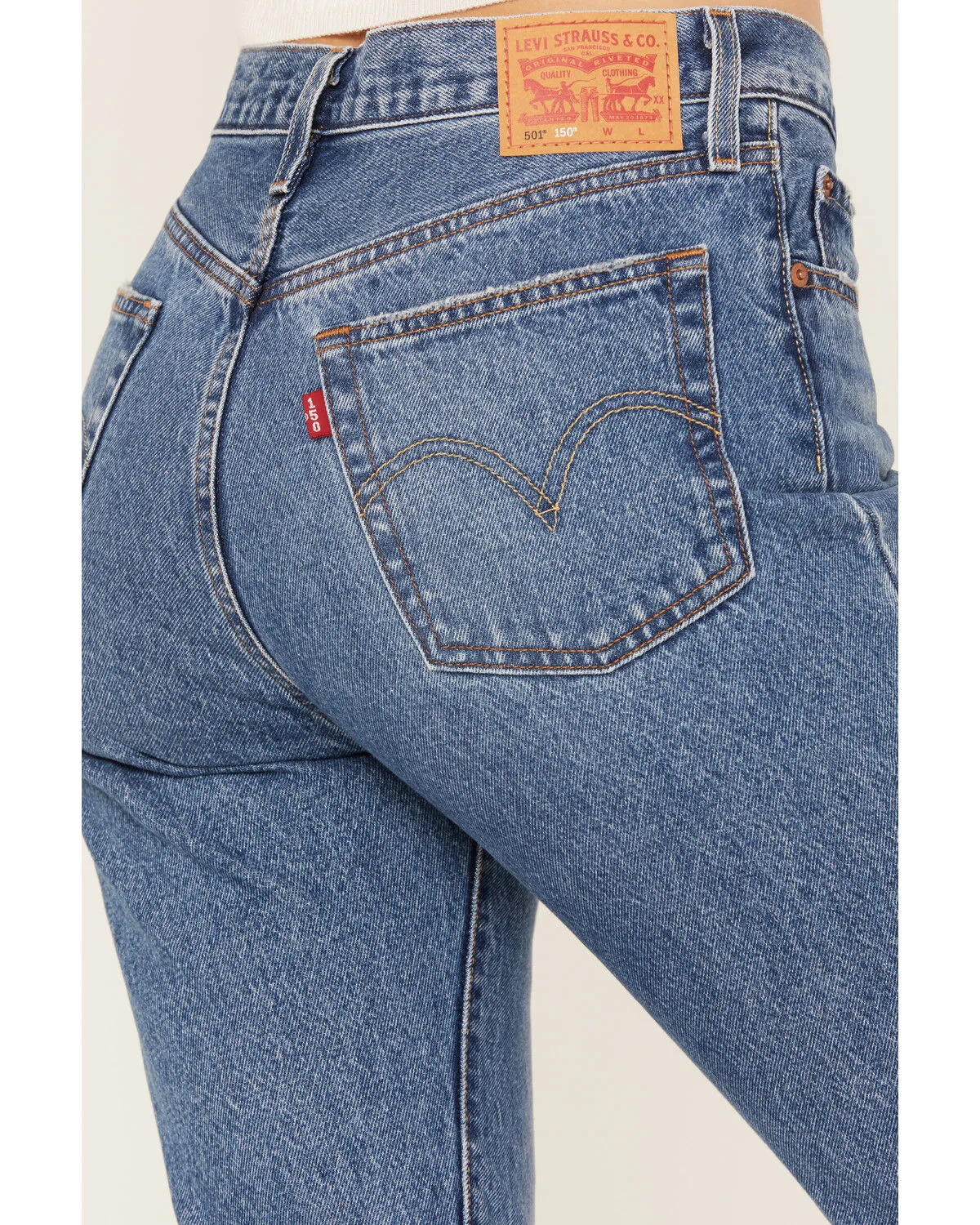 Product Name:  Levi's Women's Medium Wash 501 Pieced Destructed Jeans